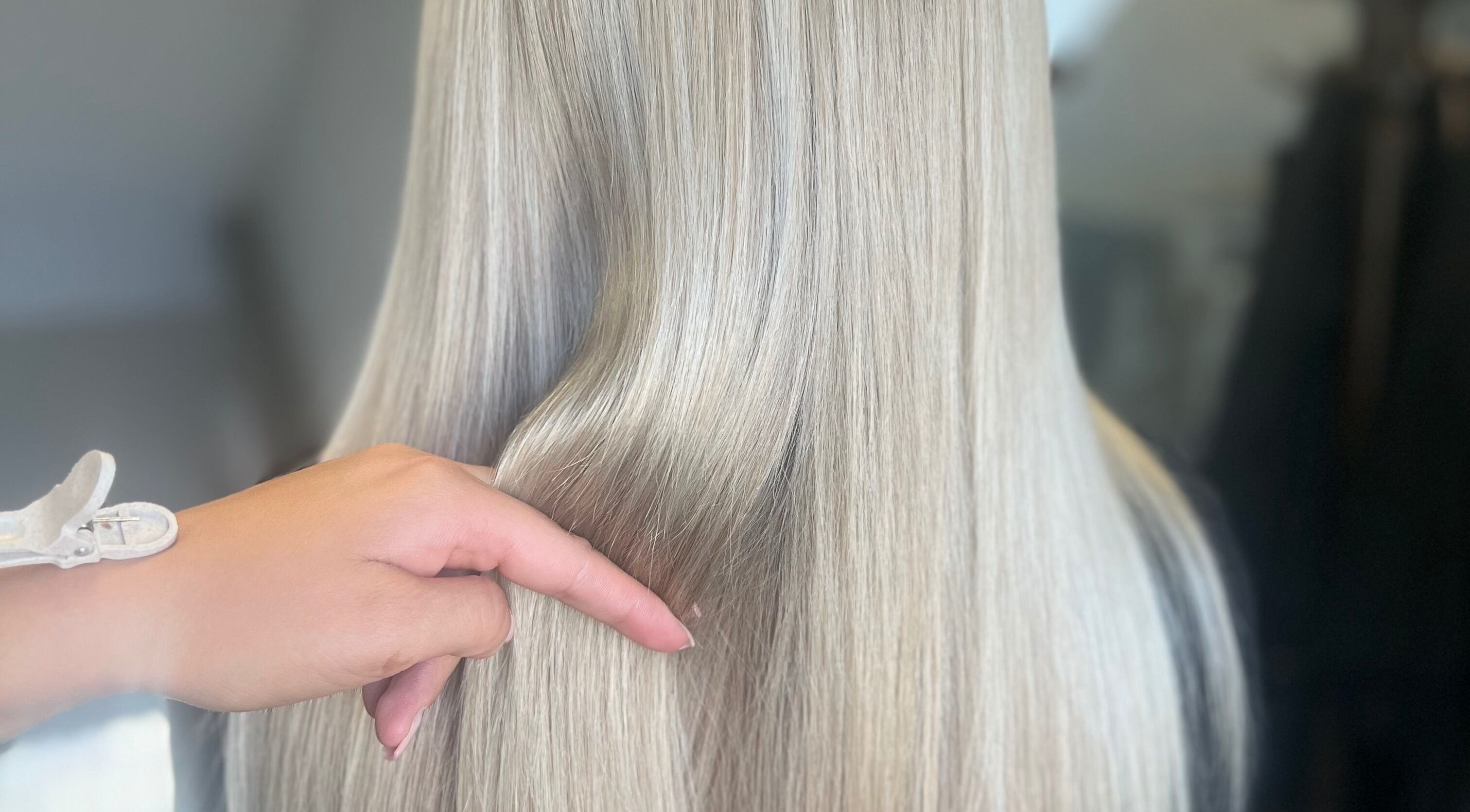 Sleek silver hair styled at Hair by Hannah Milne, Aberdeen, Scotland, GB.