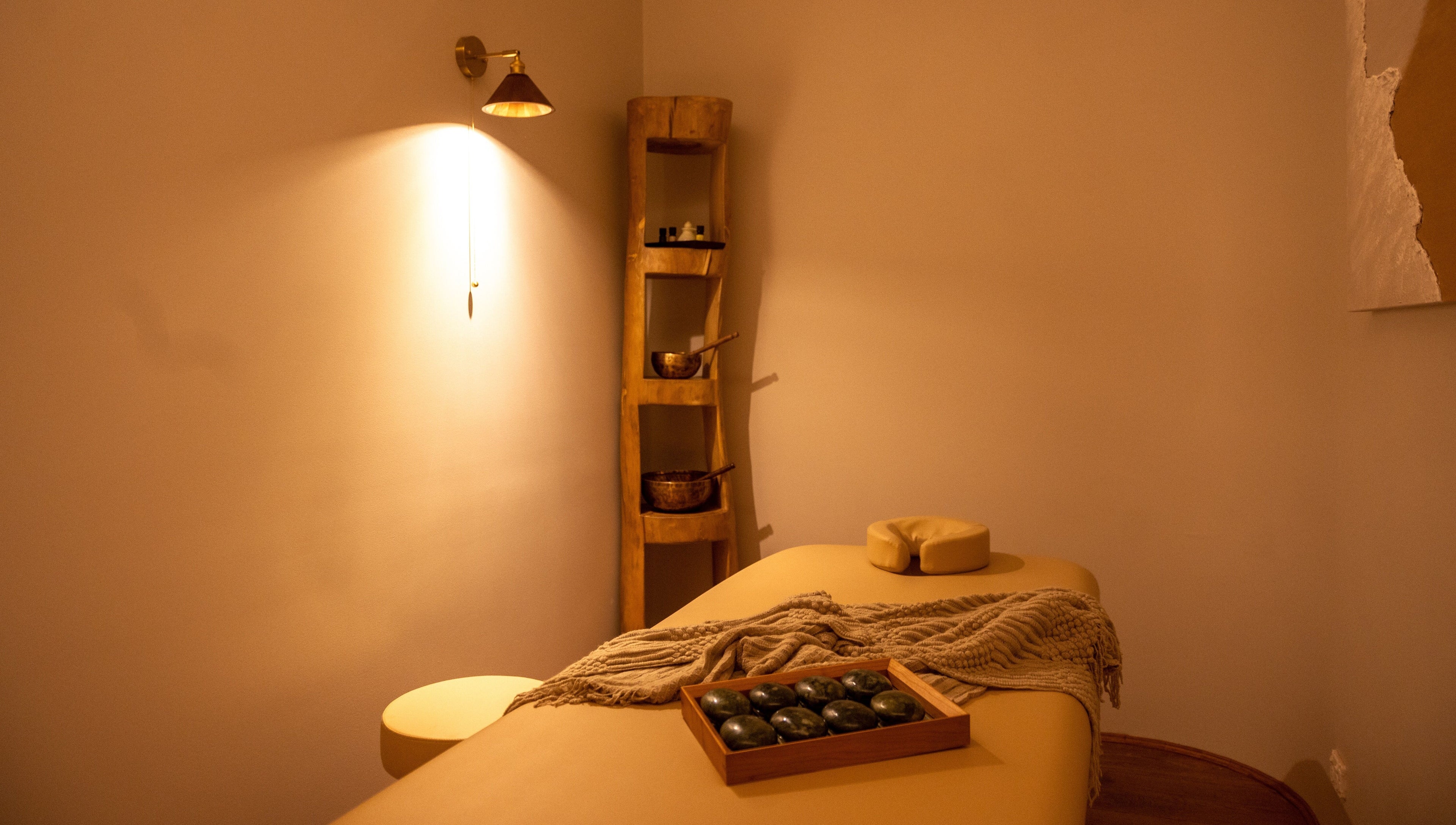 Calming massage room at Ambience Wellness - Karrinyup, Karrinyup, Western Australia, AU with warm lighting and decor.