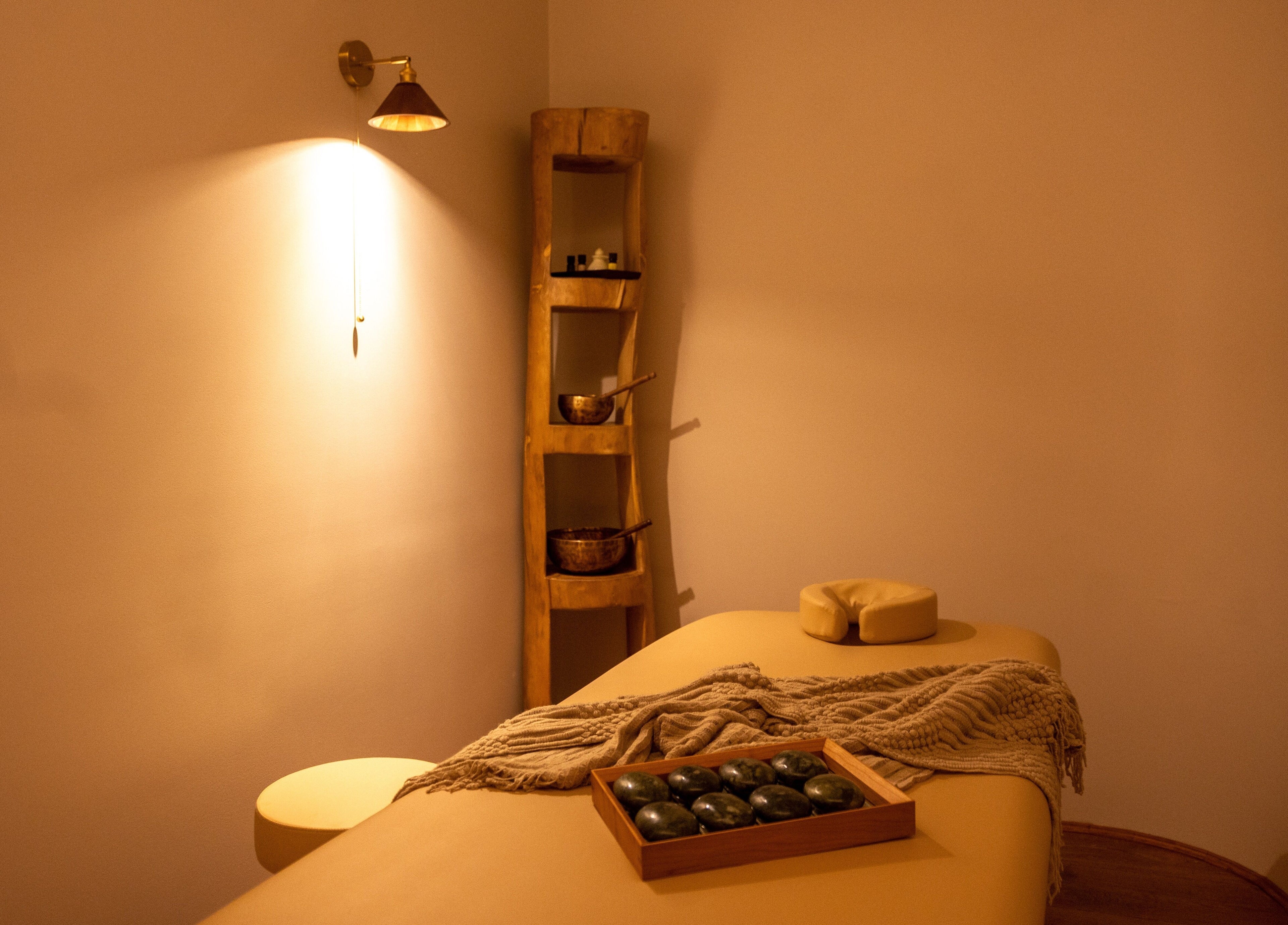 Calming massage room at Ambience Wellness - Karrinyup, Karrinyup, Western Australia, AU with warm lighting and decor.