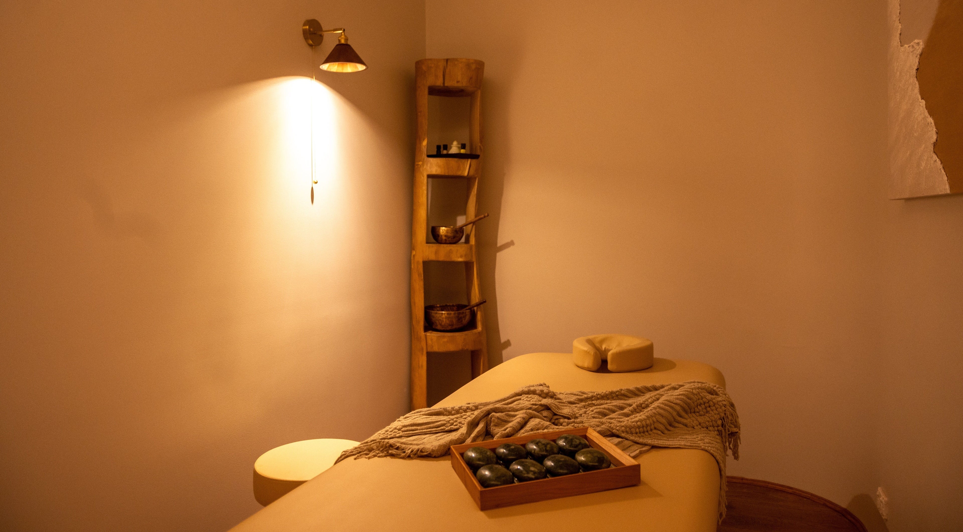 Calming massage room at Ambience Wellness - Karrinyup, Karrinyup, Western Australia, AU with warm lighting and decor.