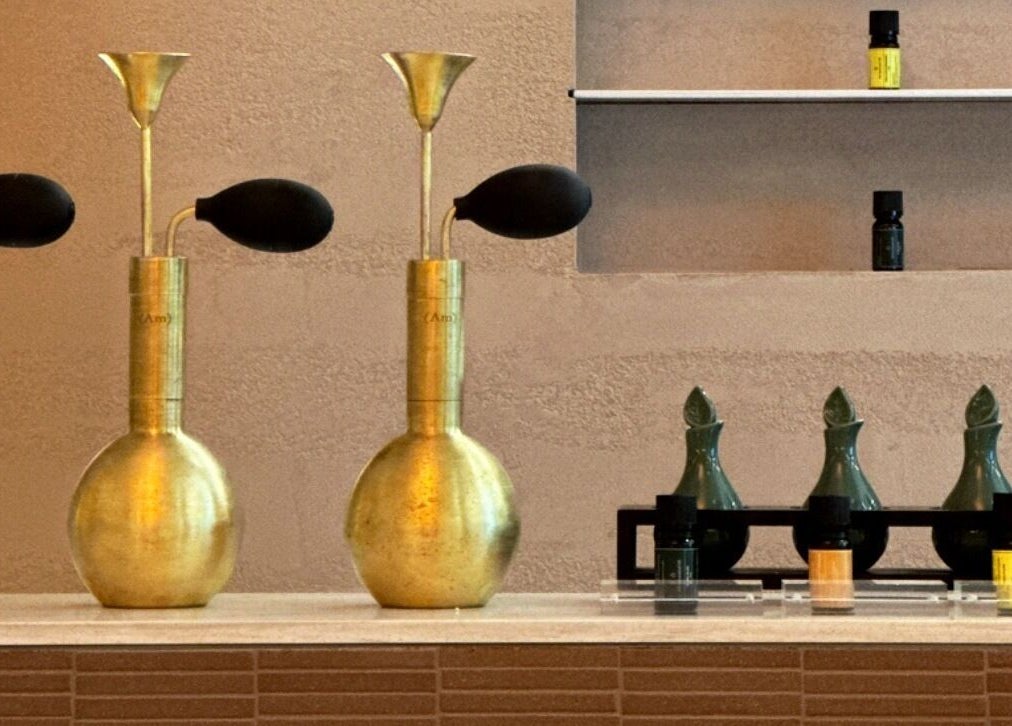 Chic decor with golden aroma bottles at Ambience Wellness - Karrinyup, Western Australia, AU.