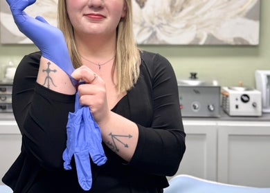 Beauty Lounge of Hanover esthetician donning gloves for client care in Hanover, Pennsylvania, US.