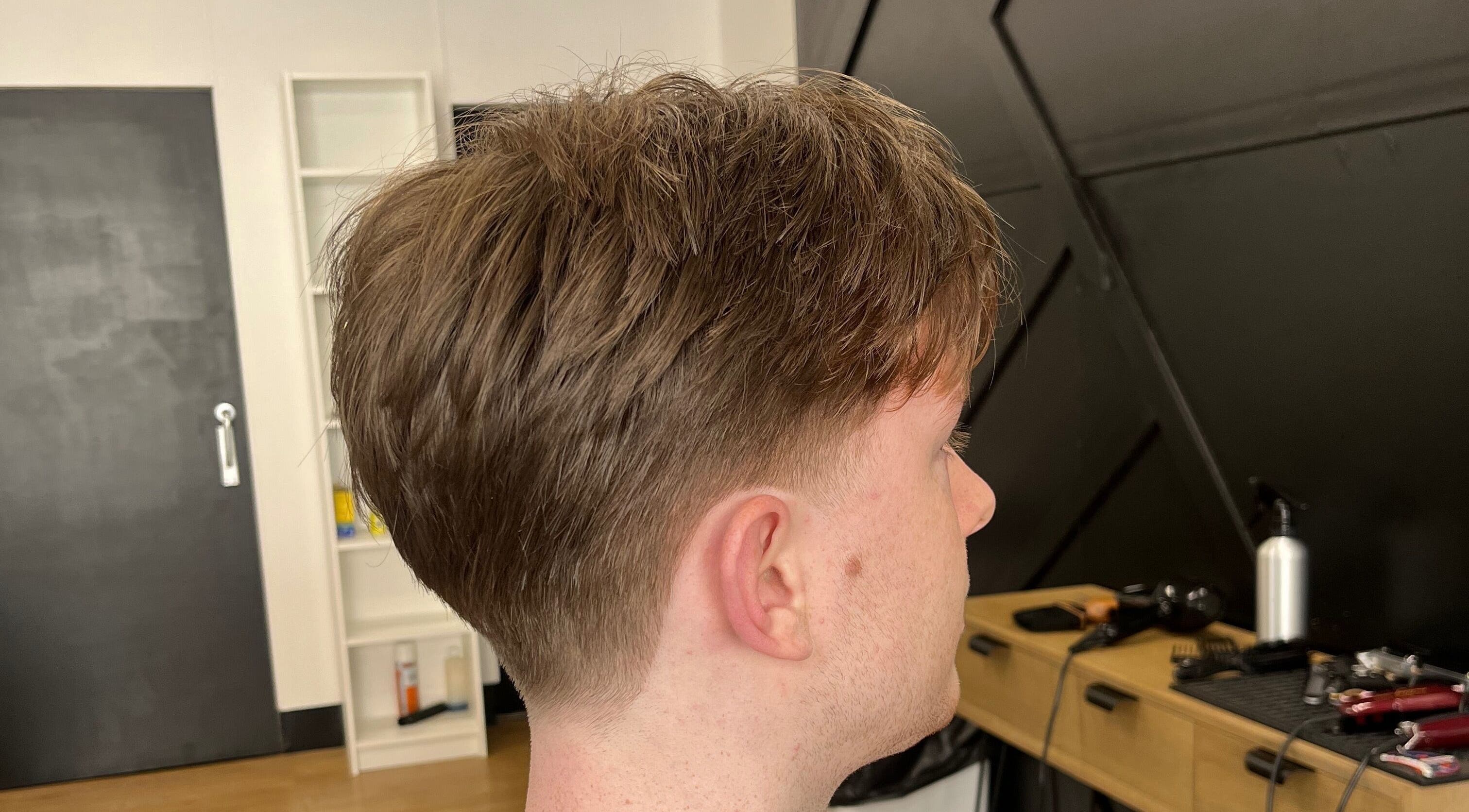 Side view of a stylish haircut at Harrison’s, Rotherham, England, GB, showcasing expert grooming.