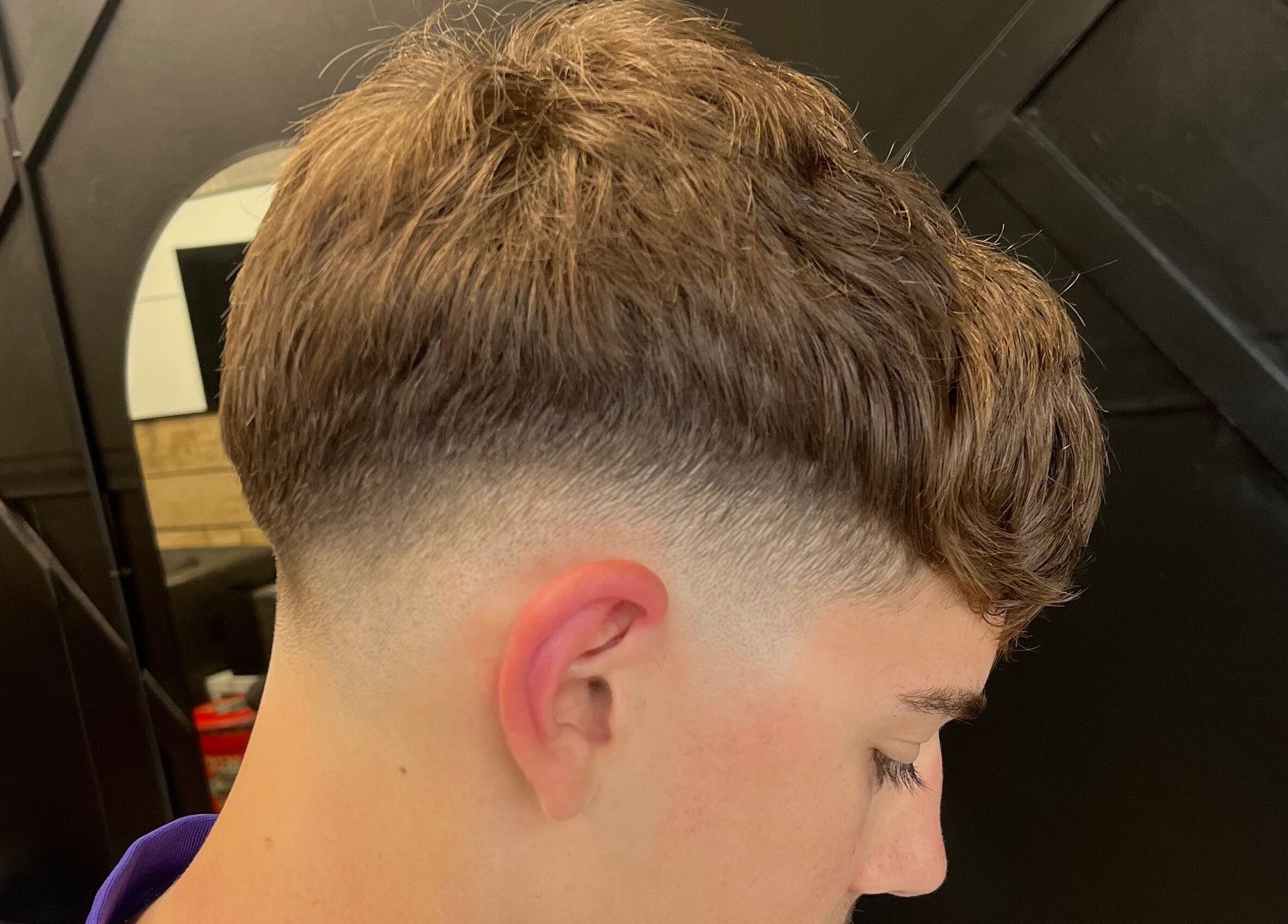 Close-up of a trendy fade haircut at Harrison’s, Rotherham, England, GB, showcasing expert styling.