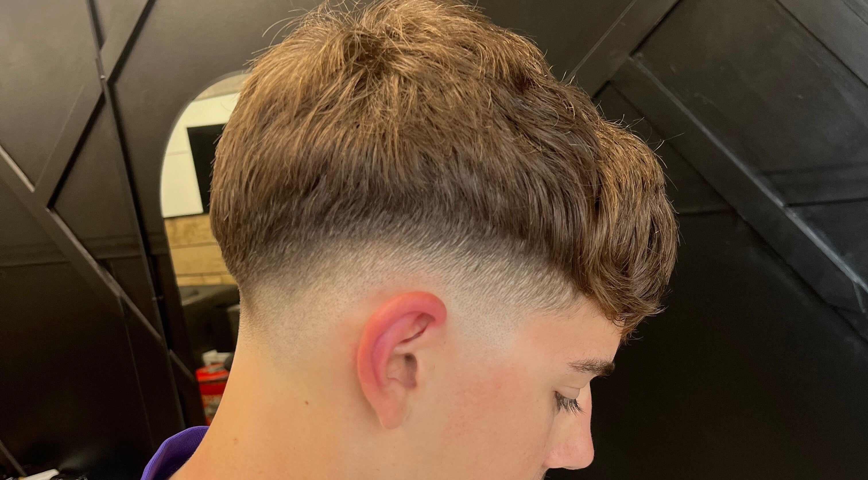 Close-up of a trendy fade haircut at Harrison’s, Rotherham, England, GB, showcasing expert styling.