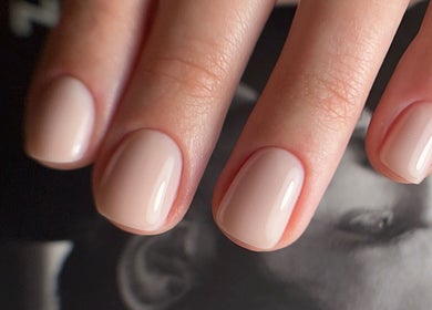 Neatly manicured nude nails at Brilliant Nails Lounge in Schaumburg, Illinois, US.