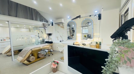 Modern interior of Bright Beauty Clinic in Great Saxham, England, showing elegant treatment room and decor.