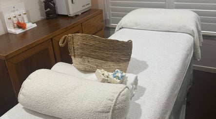Tranquil treatment room at Sea Beauty Therapy, Trinity Park, Queensland, AU with soft towels and decor.