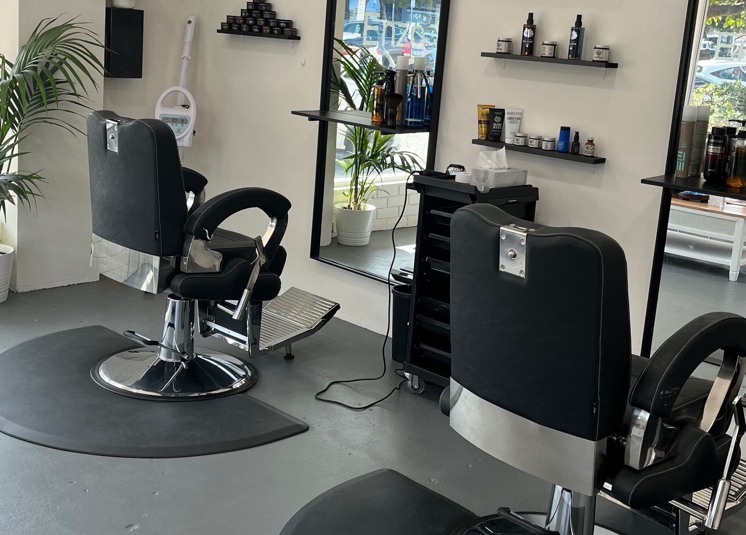 Enzo Stylez salon interior with stylish chairs and mirrors in Cottesloe, Western Australia, AU.