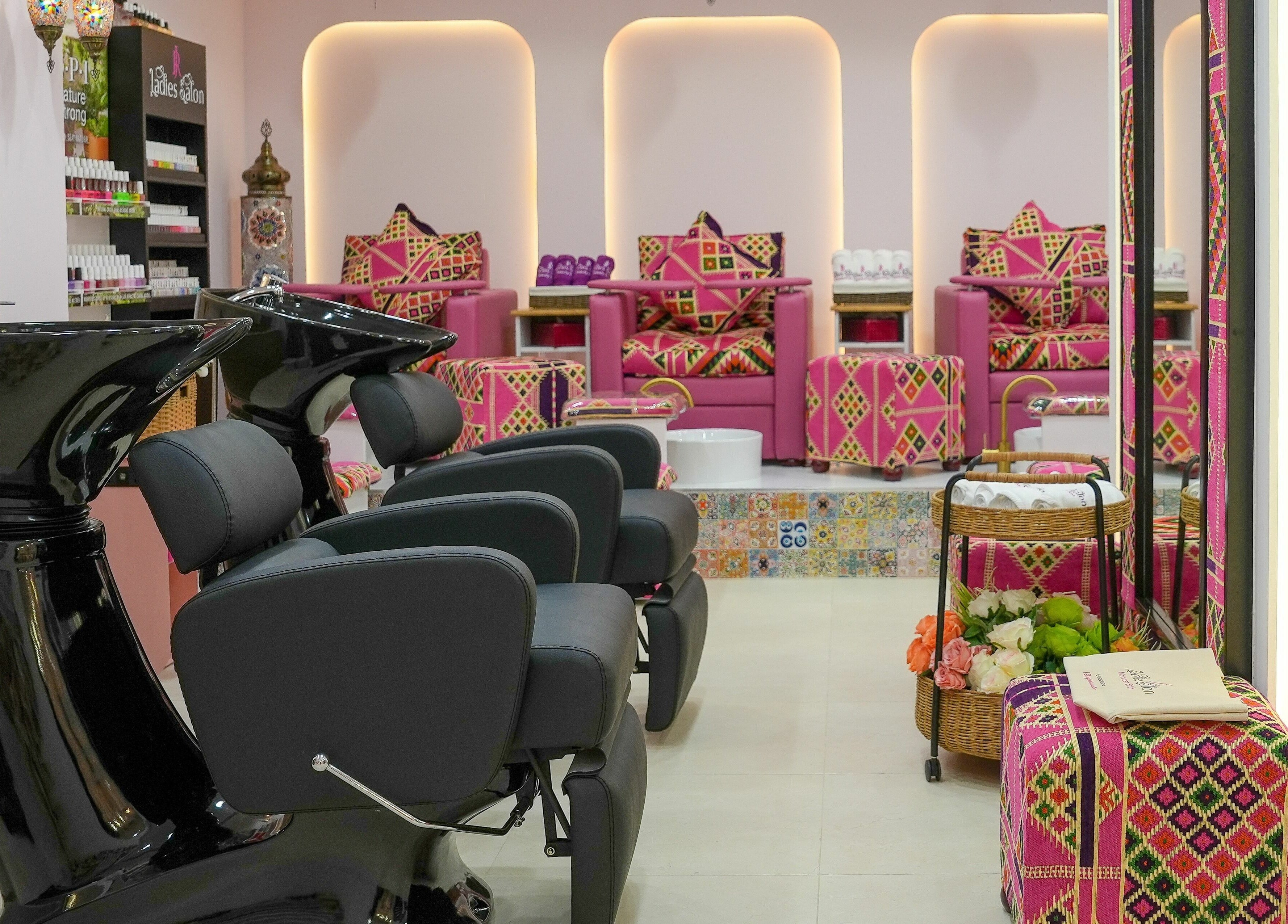 Elegant interior of R N J Ladies Salon in Dubai, Dubai, AE, featuring stylish salon chairs and vibrant decor.