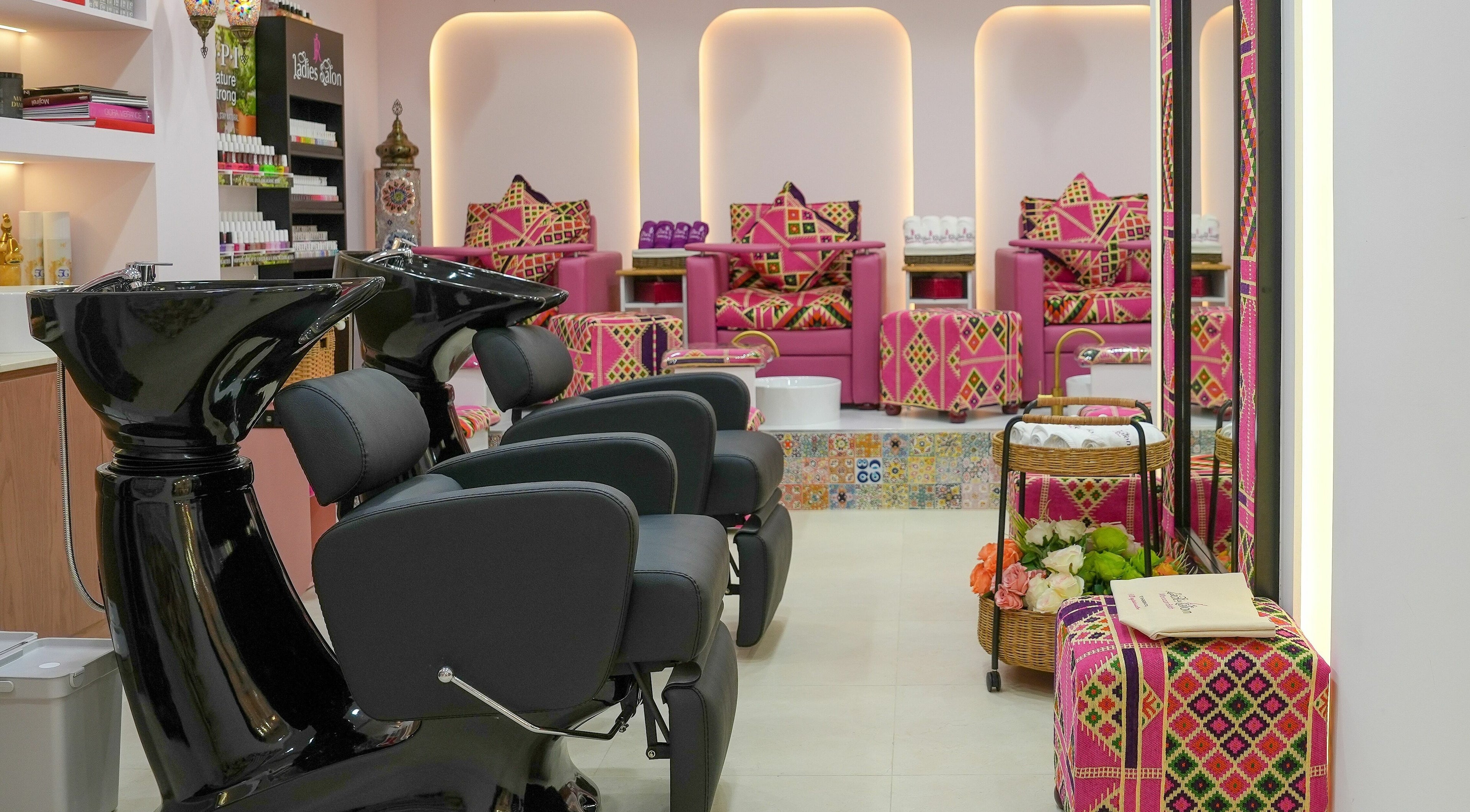 Elegant interior of R N J Ladies Salon in Dubai, Dubai, AE, featuring stylish salon chairs and vibrant decor.