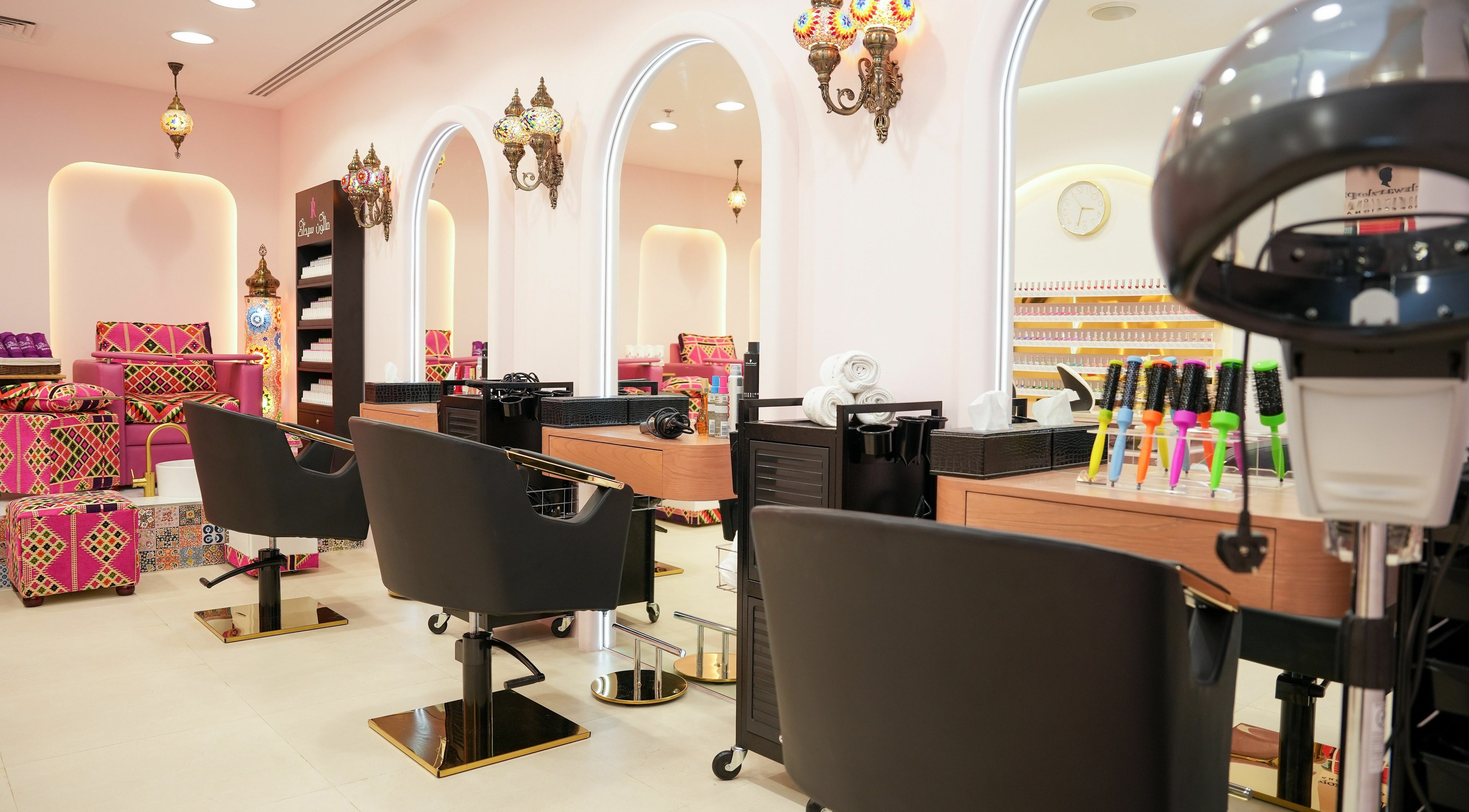 Interior of R N J Ladies Salon in Dubai, Dubai, AE, featuring stylish chairs and modern beauty equipment.