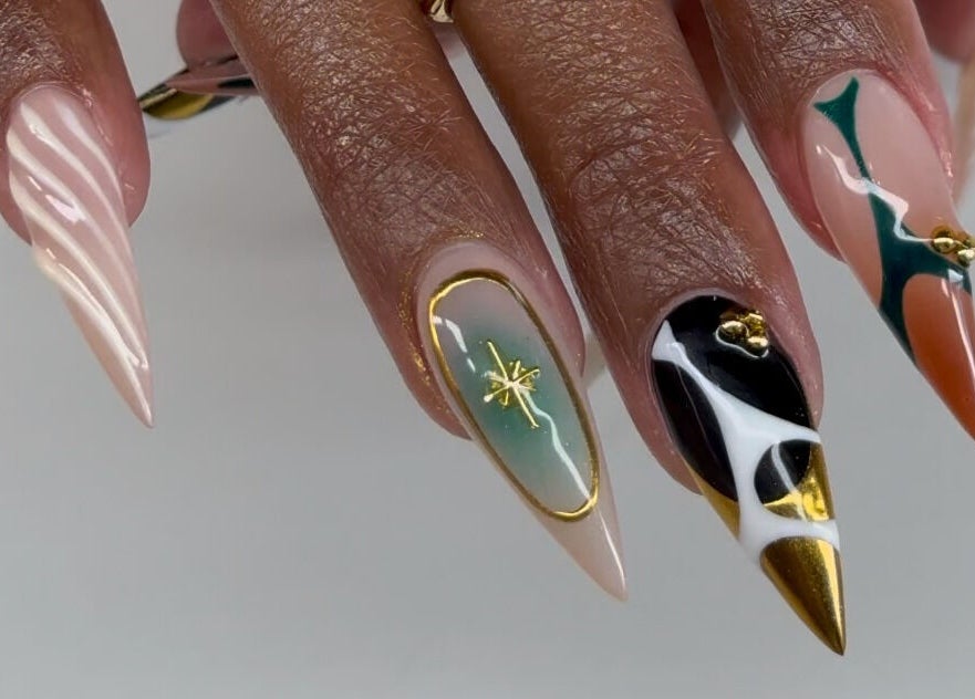 Intricate nail art with bold colors at Chloe's Shade Room, Tempe, Arizona, US.