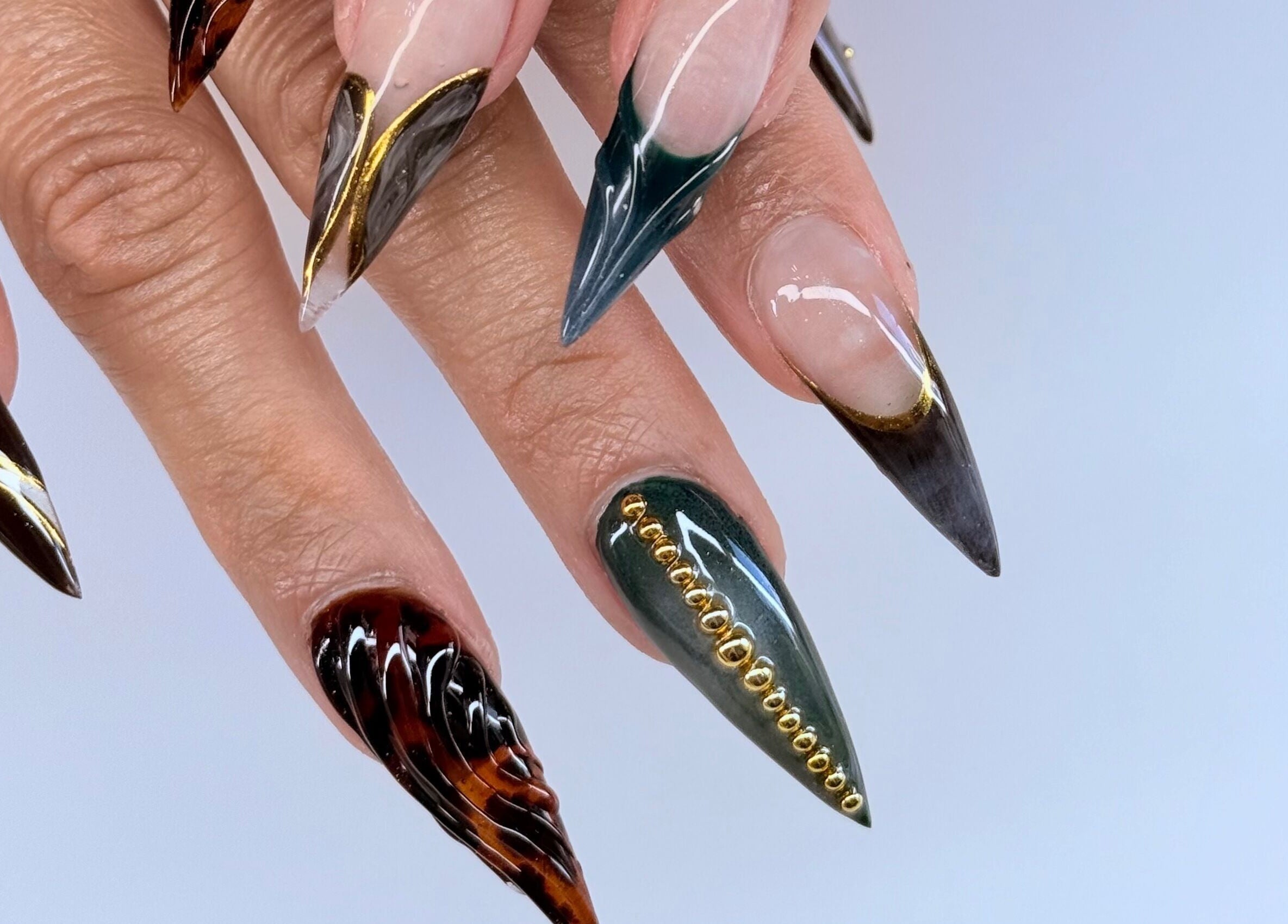 Stunning nail art with intricate designs at Chloe’s Shade Room, Tempe, Arizona, US.