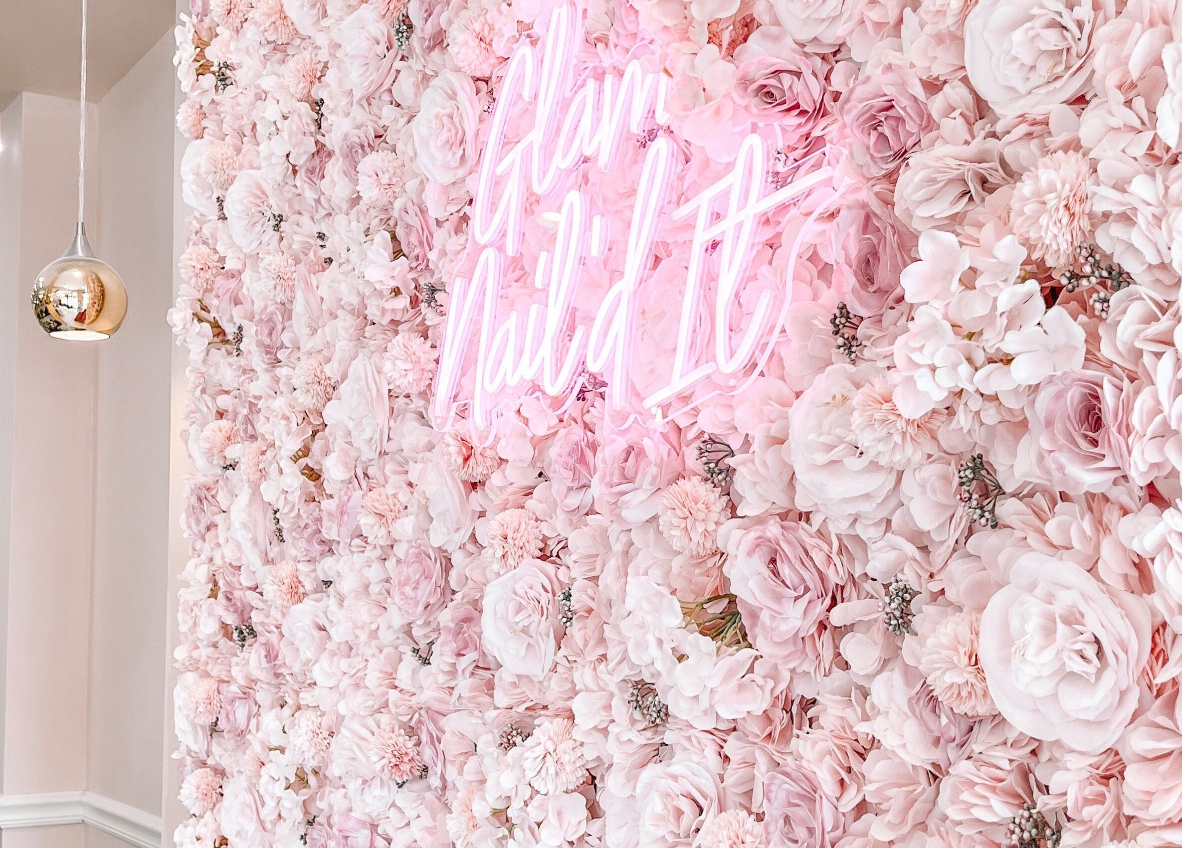 Elegant floral wall with pink roses at Glam Nails And Spa, Bowling Green, Kentucky, US.