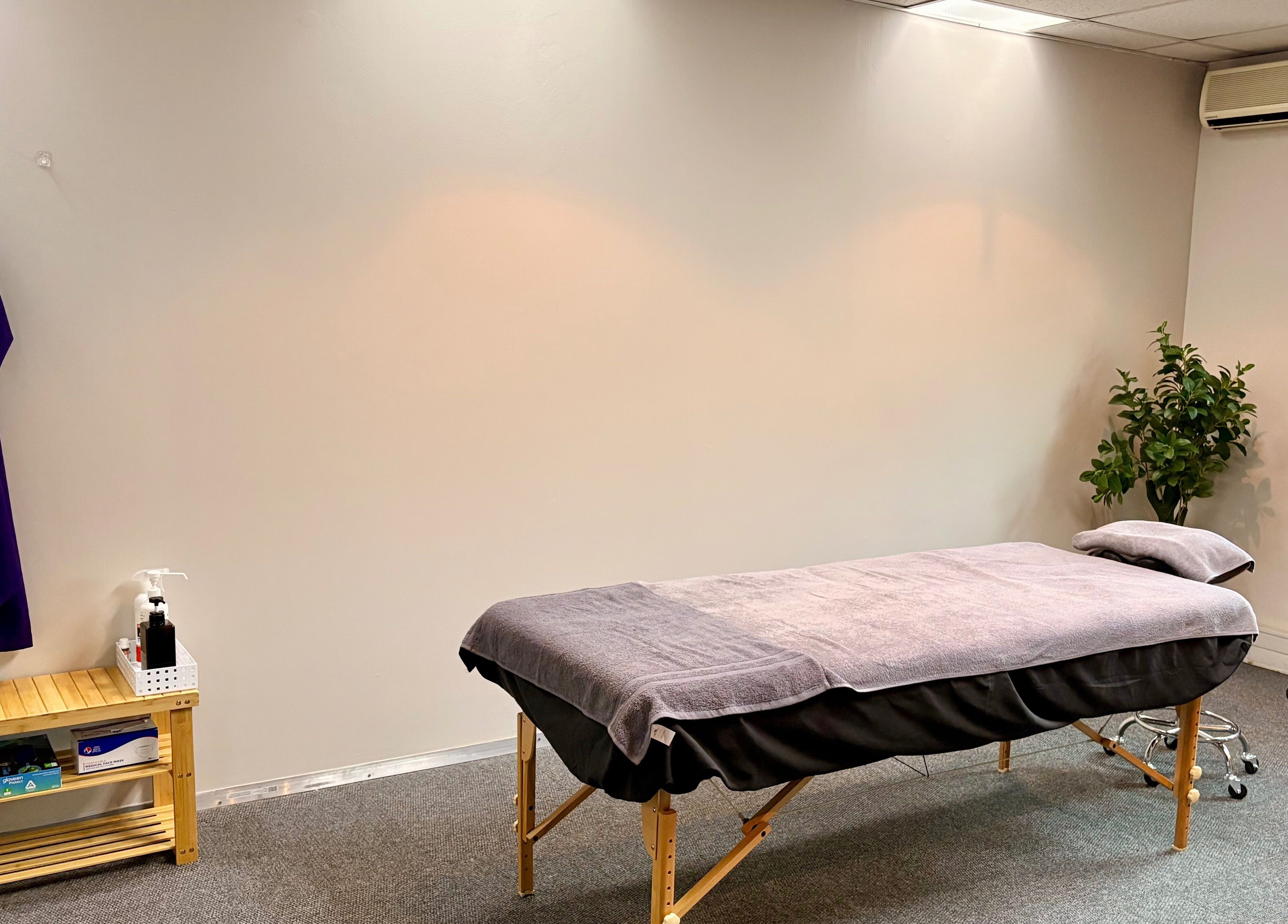 Massage room at LX Sports Therapy, Sandton, Gauteng, ZA with a treatment bed, relaxing ambiance.