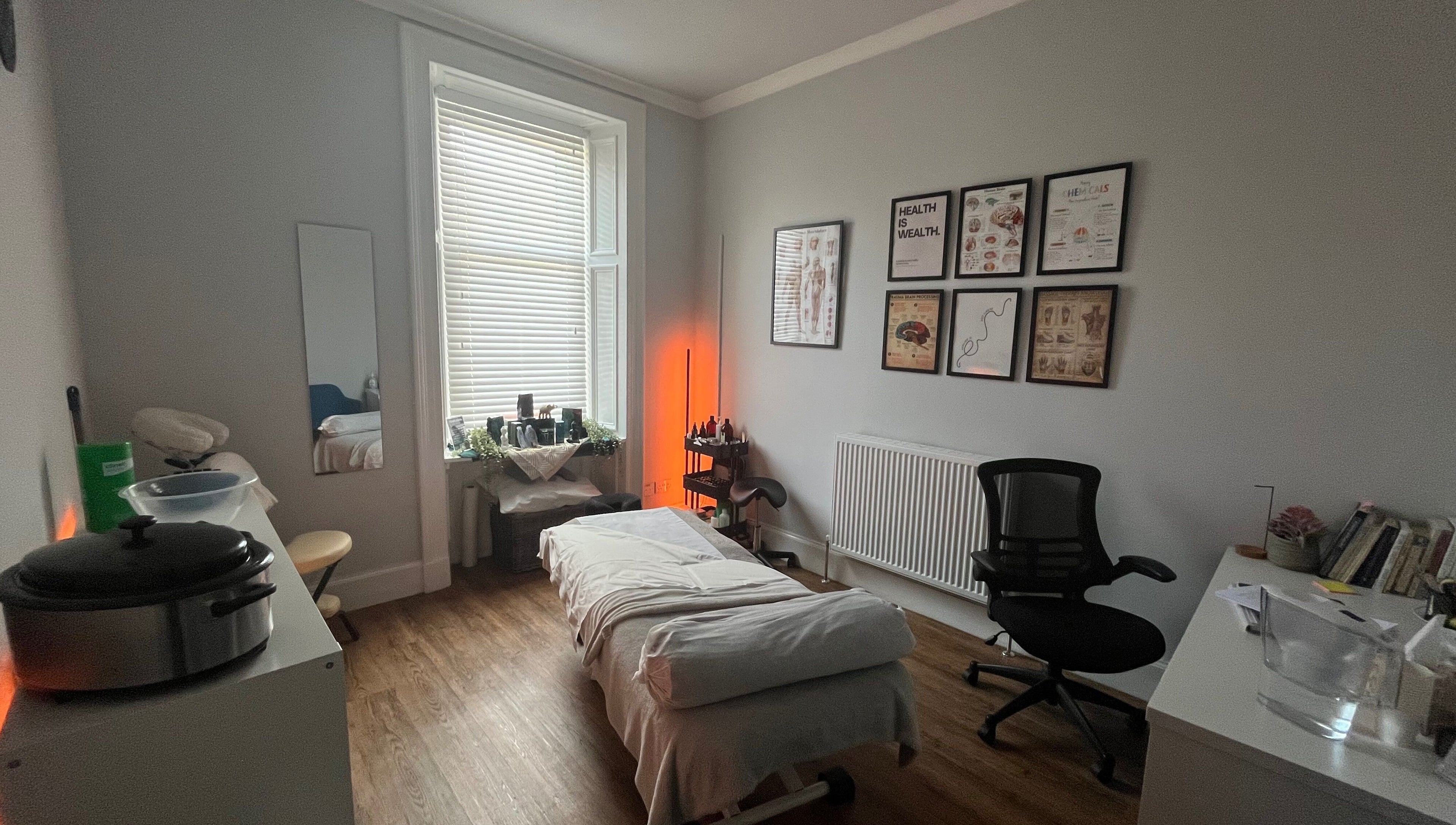Calming therapy room at Holistic Healthcare Ayrshire in Ayr, Scotland, GB with massage table and wellness decor.