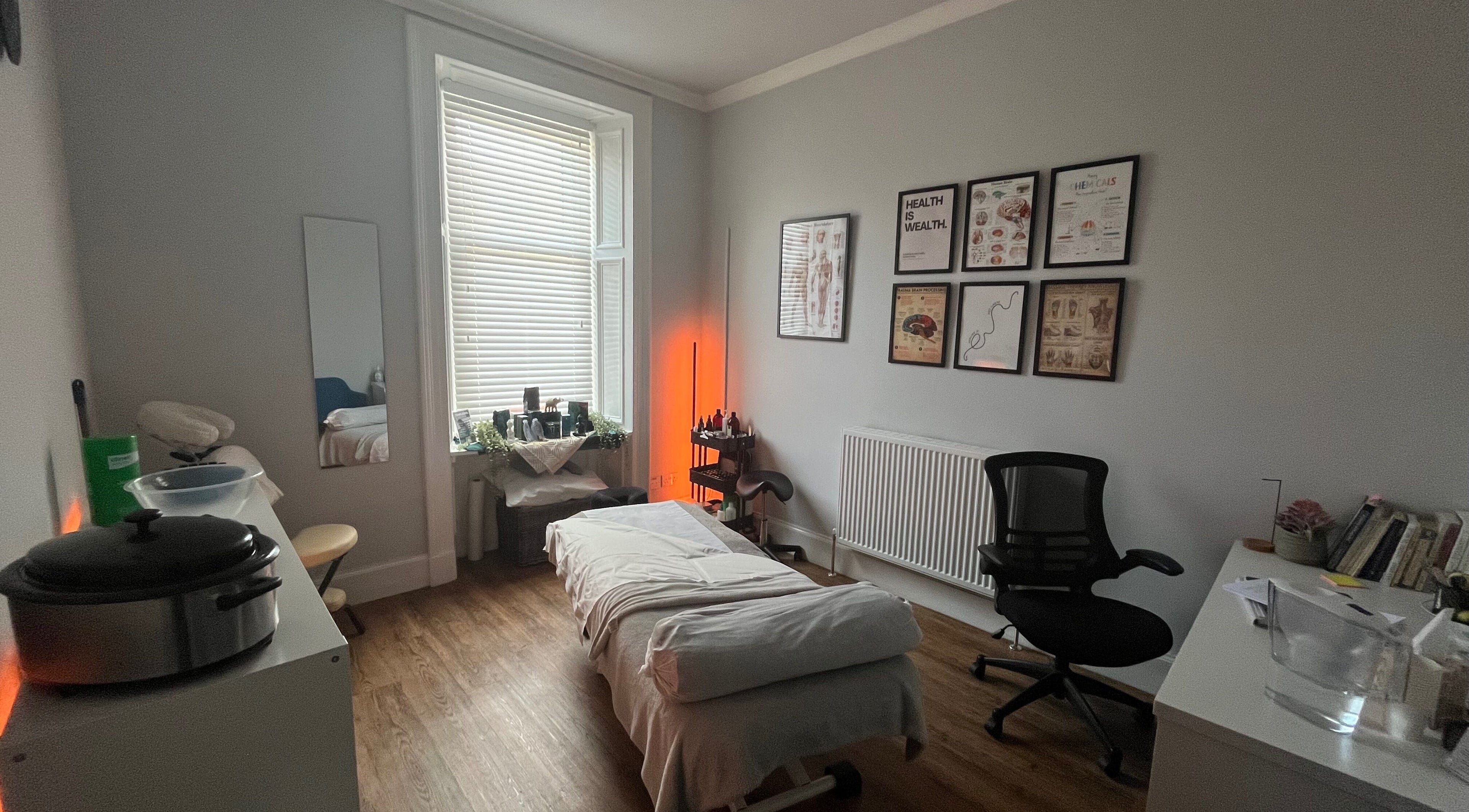 Calming therapy room at Holistic Healthcare Ayrshire in Ayr, Scotland, GB with massage table and wellness decor.