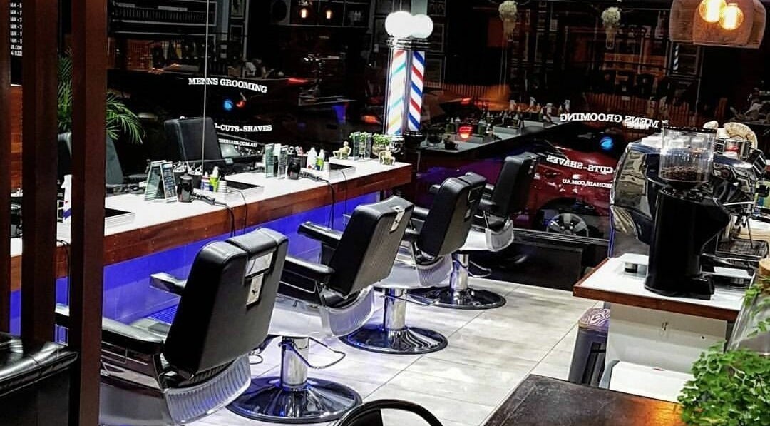 Interior of Teddy's Barber Shop and Laser Clinic in Melbourne, Victoria showing modern barber chairs.