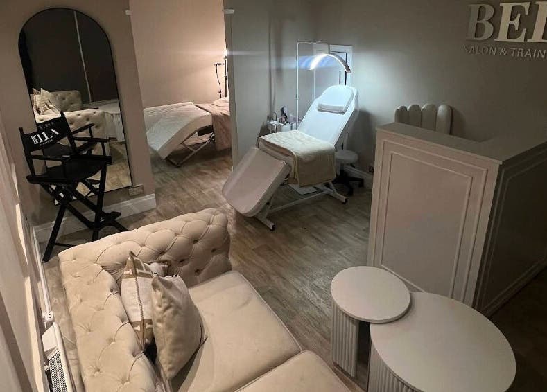 Stylish treatment room at Bella by Hannah, Bradford, England, GB with luxe seating and professional equipment.