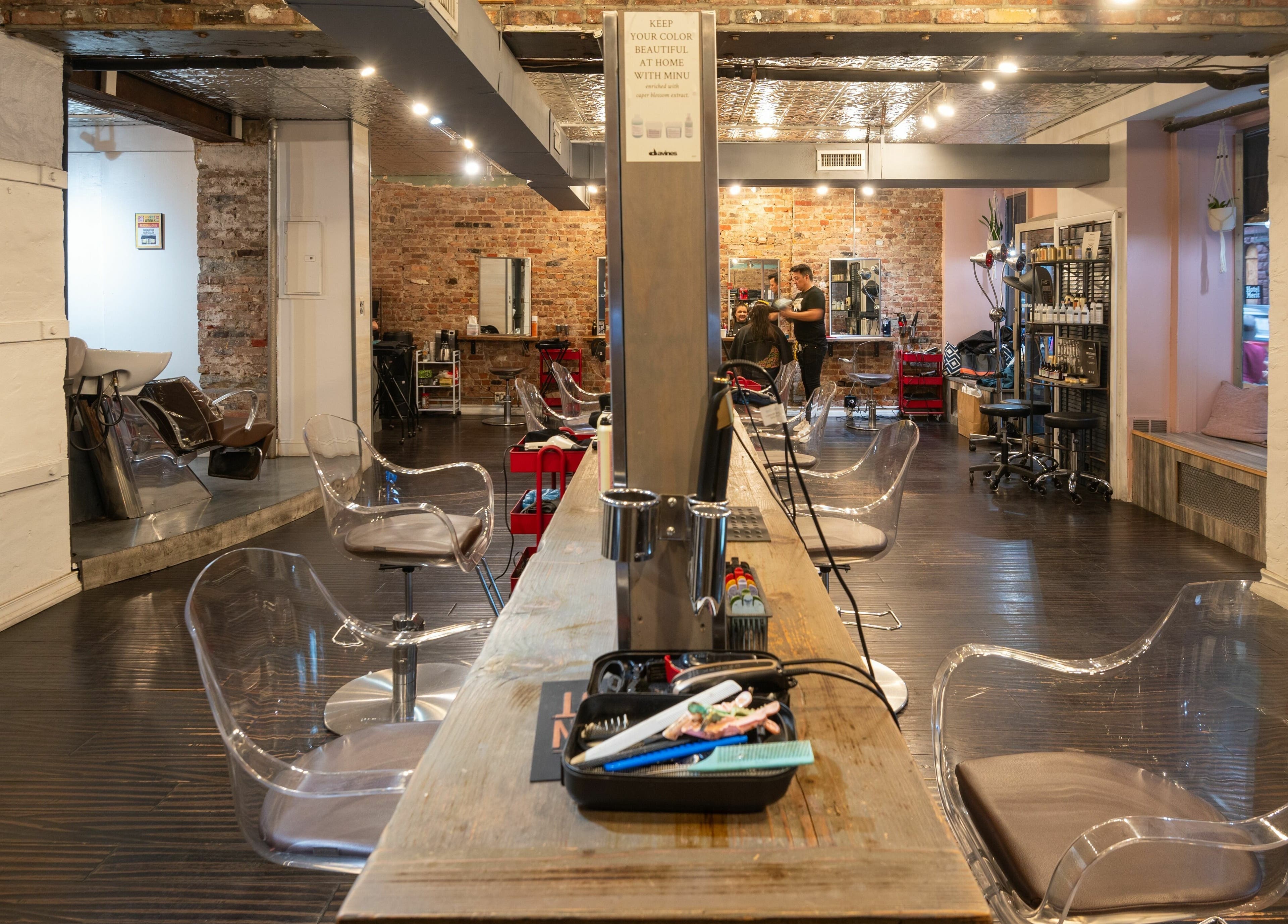 Stylish seating in David Ryan Salon, New York, New York, US showcasing elegant décor and modern facilities.