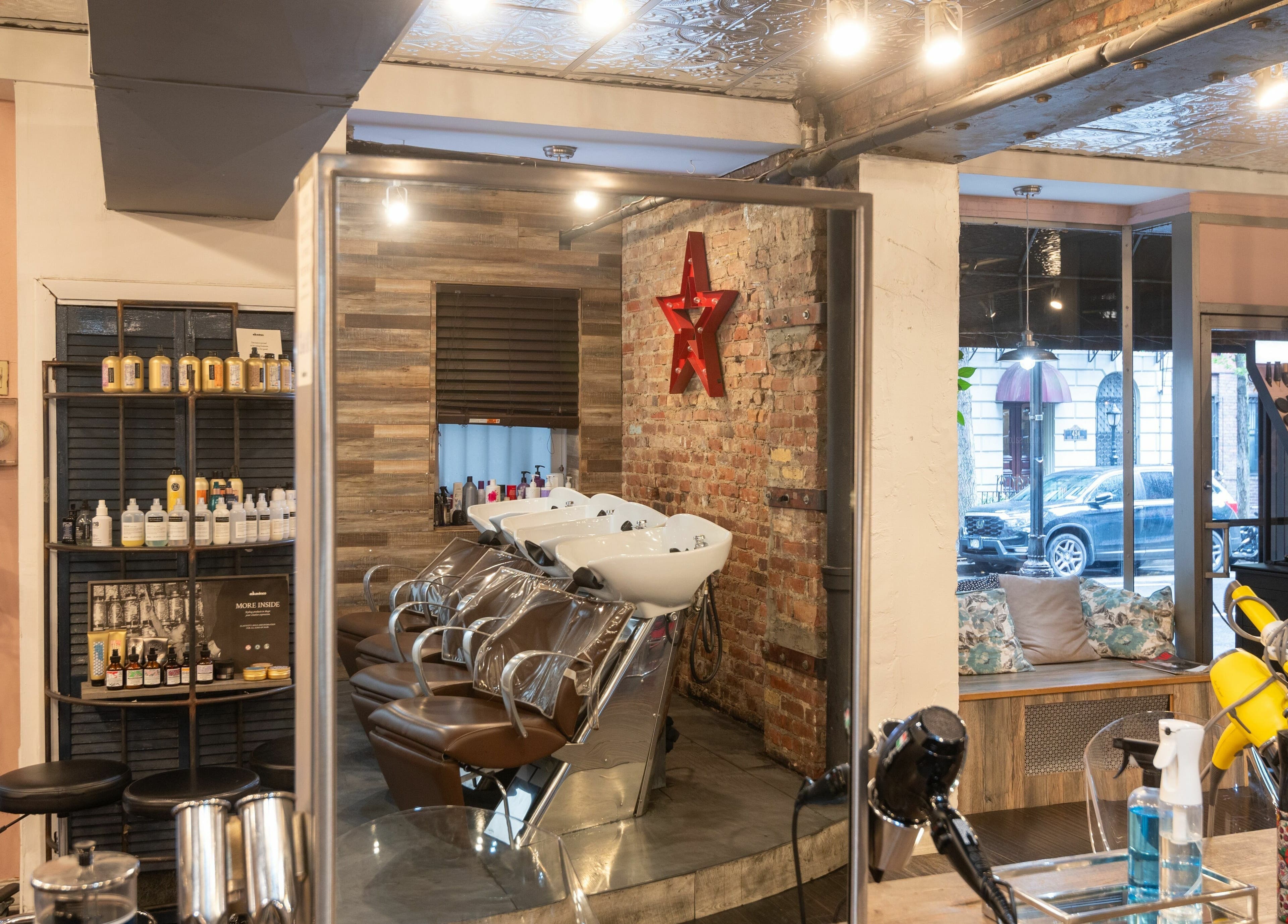 Stylish seating and wash stations at David Ryan Salon, New York, New York, US. Cozy and modern decor.
