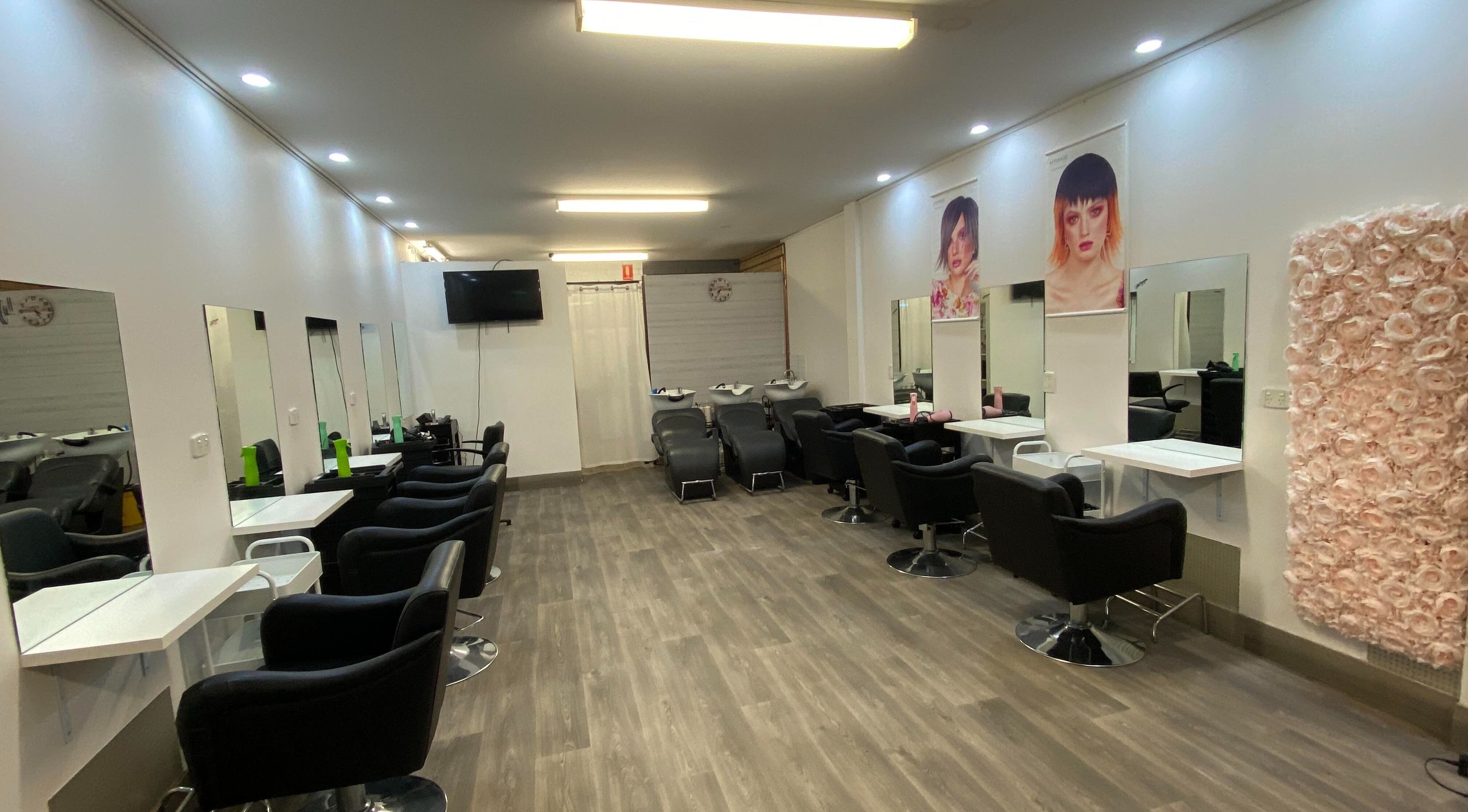 Modern salon interior at Hairworkz Eagleby, featuring chic styling stations in Eagleby, Queensland, AU.