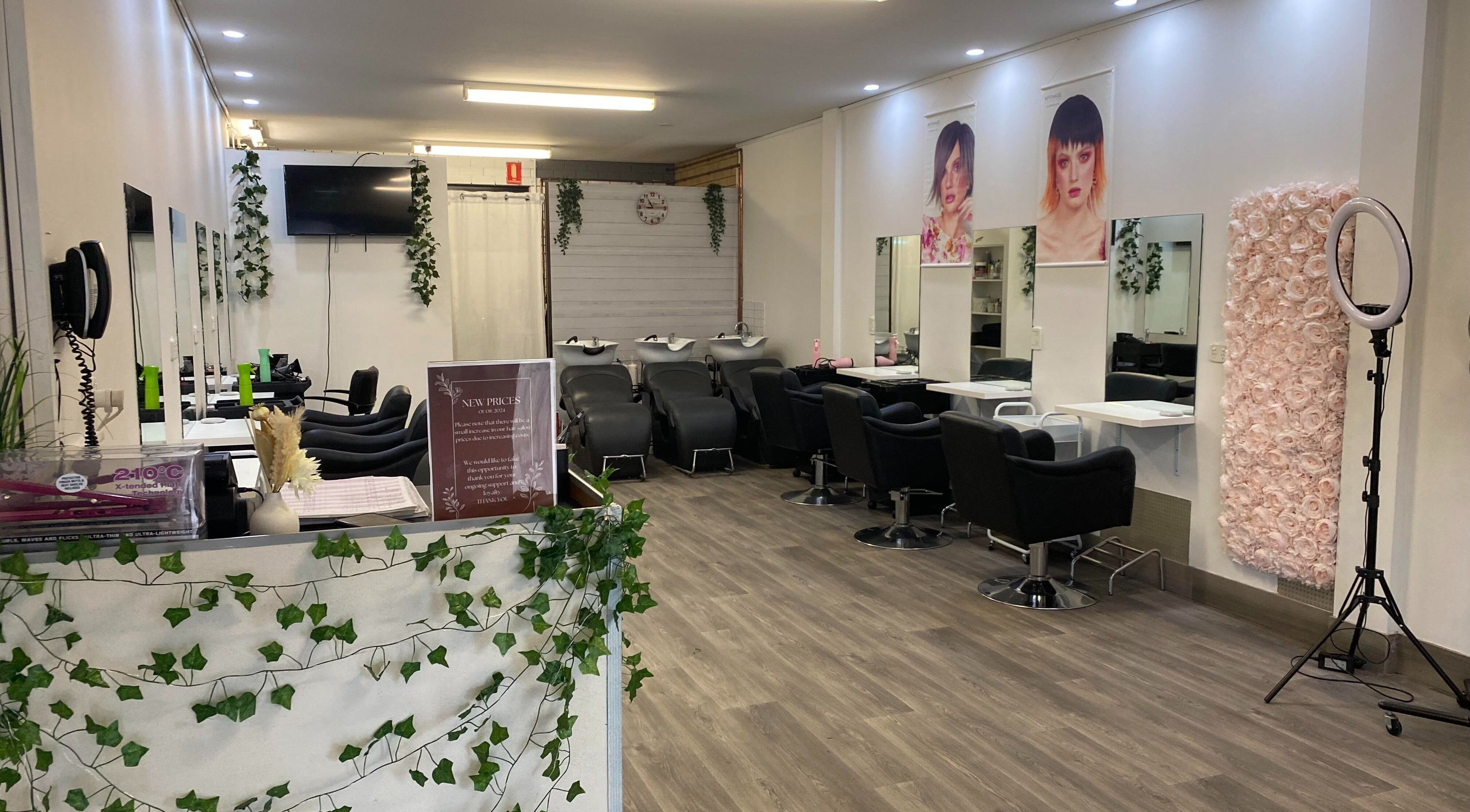 Stylish Hairworkz Eagleby salon in Eagleby, Queensland, AU showcasing modern chairs and decor.
