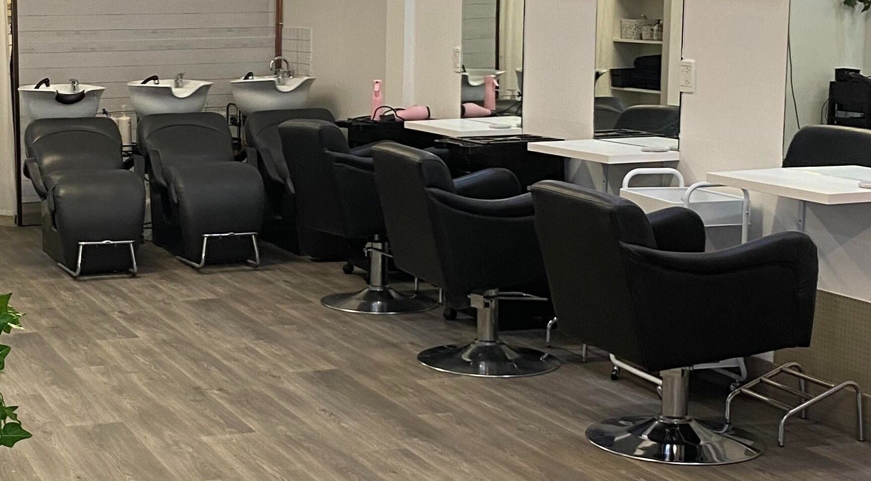 Modern salon chairs and wash stations at Hairworkz Eagleby, Eagleby, Queensland, AU.