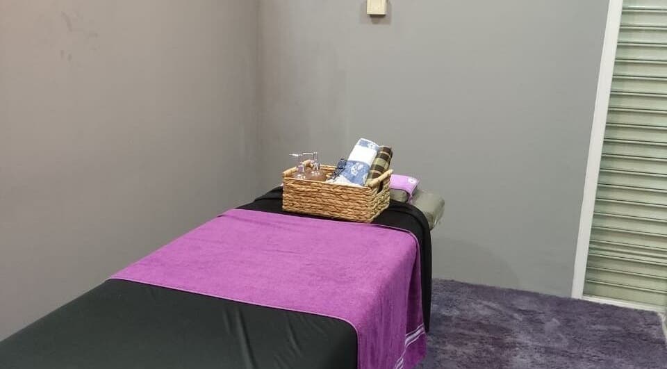 Relaxing massage room at Khawla Medispa (Mama Wellness) in Simpang Ampat, Pulau Pinang, MY, with cozy decor.