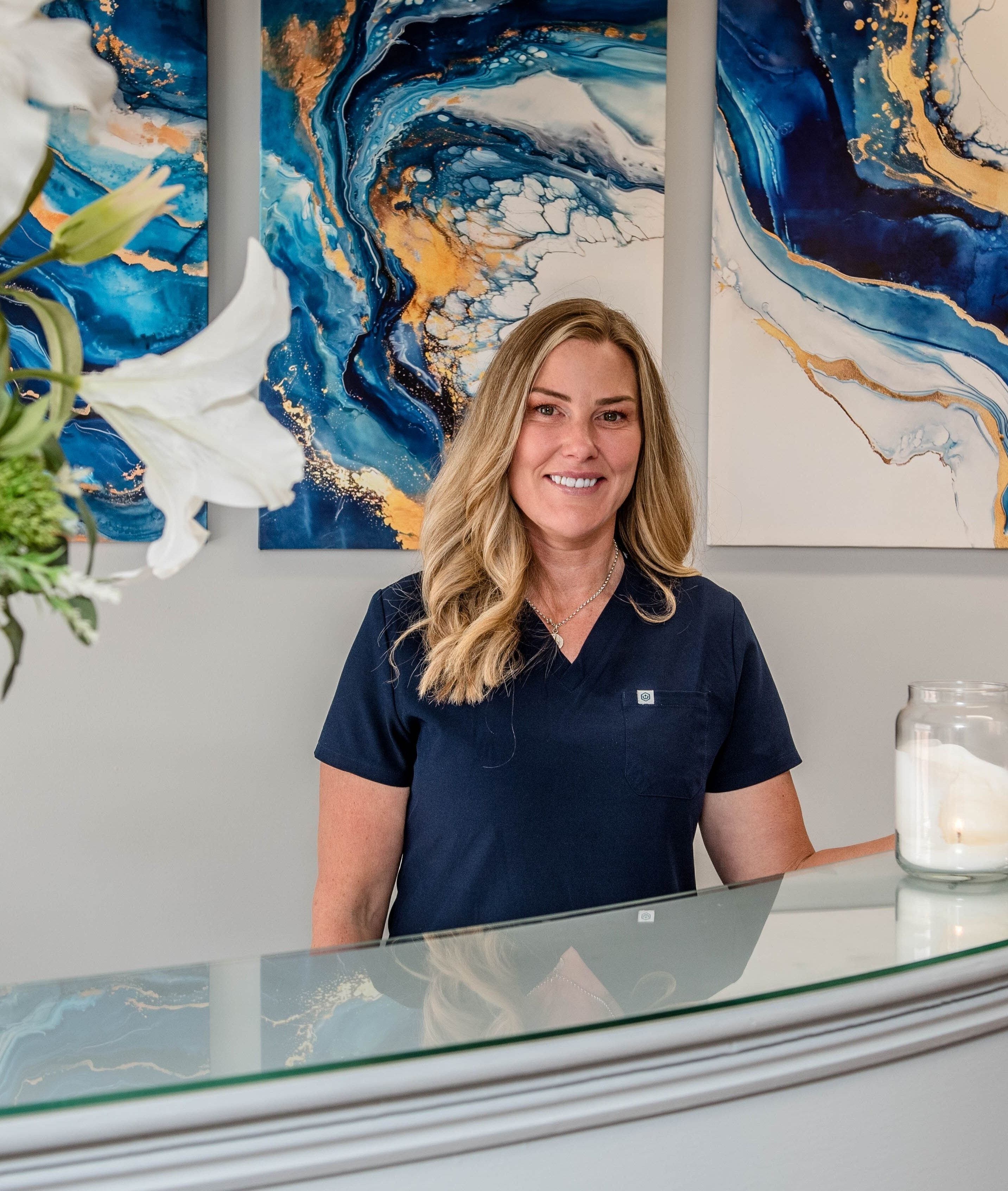 Warm welcome at NuSkin Solutions reception, Richmond, England, GB, with elegant floral decor.