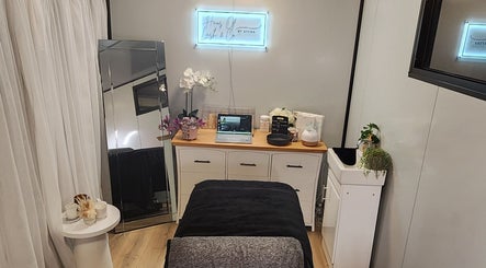 Elegant interior of Haus of Lash & Co by Aysha, Melbourne, Victoria, AU, featuring a treatment bed and decor.