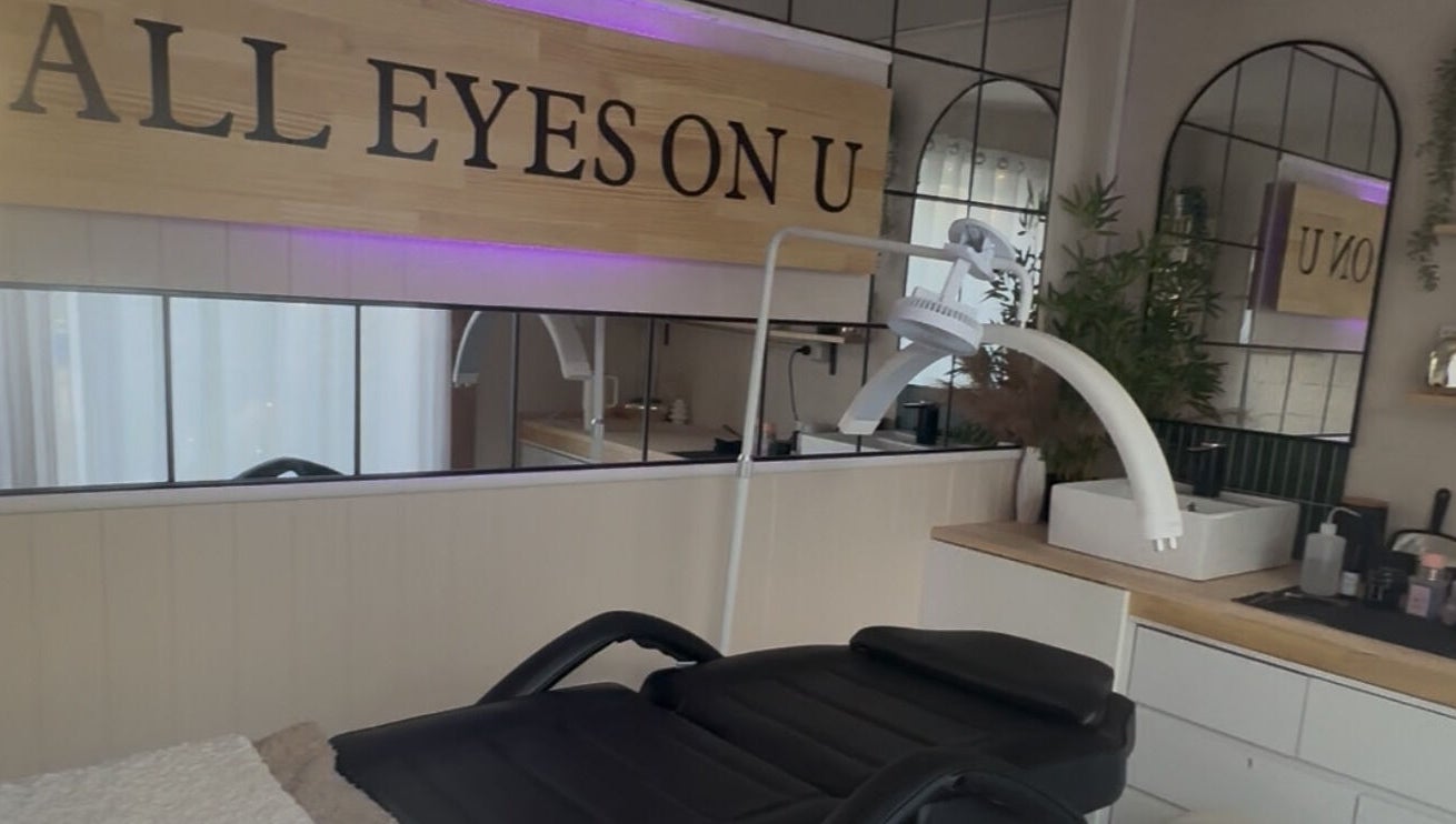 Modern treatment room at All Eyes On U, Melbourne, Victoria, AU with sleek design and comfortable black chair.