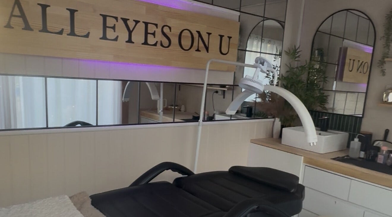 Modern treatment room at All Eyes On U, Melbourne, Victoria, AU with sleek design and comfortable black chair.