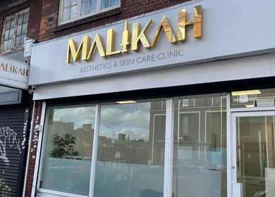 Malikah Aesthetics Ltd storefront in London, England showcasing elegant signage.