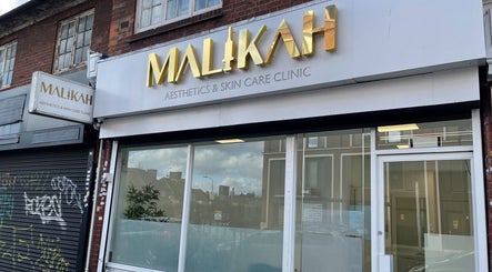 Malikah Aesthetics Ltd storefront in London, England showcasing elegant signage.