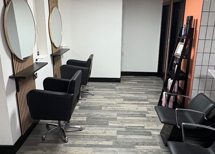 Chic interior of LS Studio in Rotherham, England, GB, featuring stylish salon chairs and mirrors.