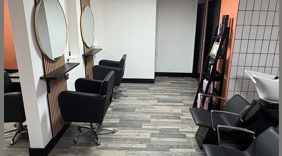 Chic interior of LS Studio in Rotherham, England, GB, featuring stylish salon chairs and mirrors.