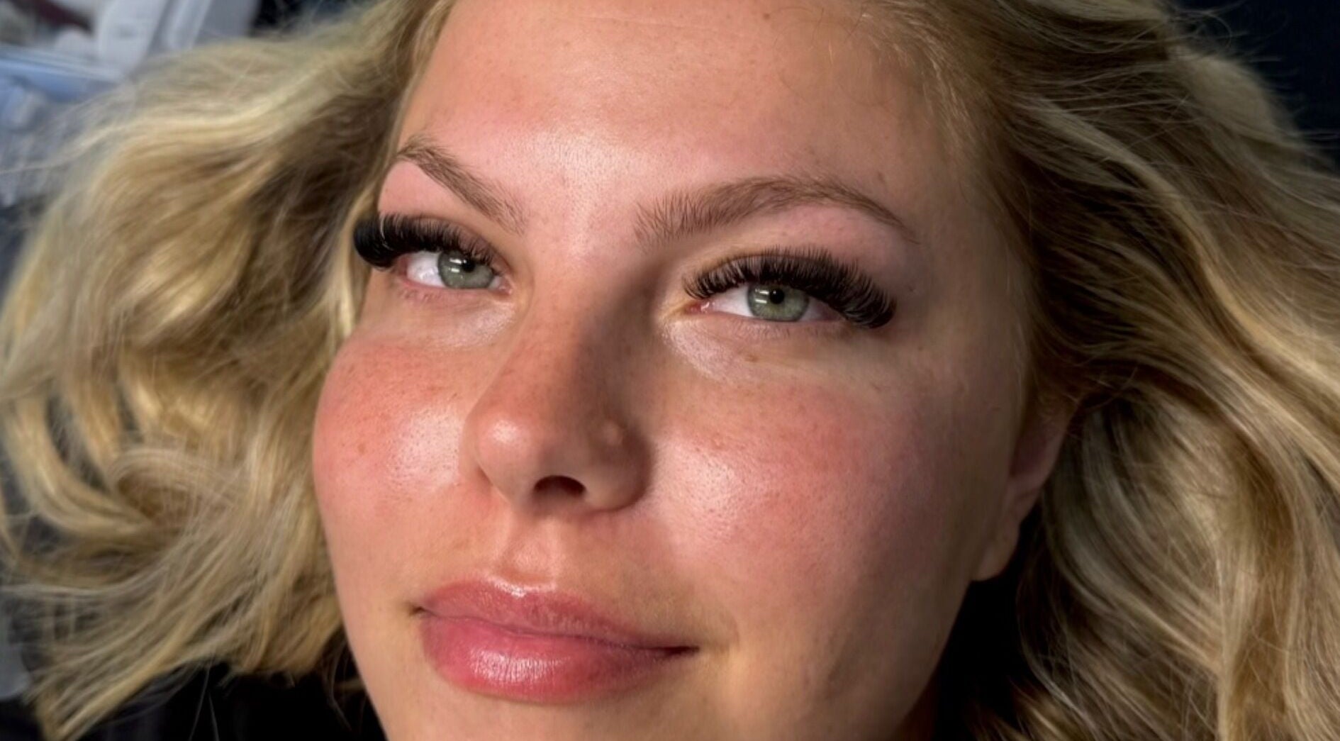 Close-up of a woman's face with elegant lash extensions by.elliemagee in Hebburn, England, GB.