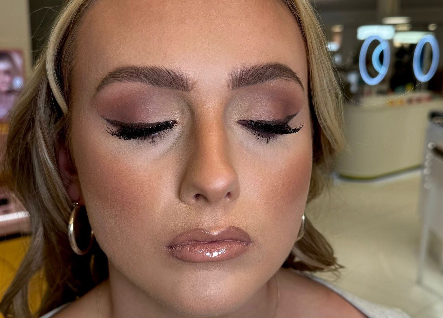 Close-up of a woman with elegant makeup by.elliemagee in Hebburn, England, GB, highlighting beauty services.