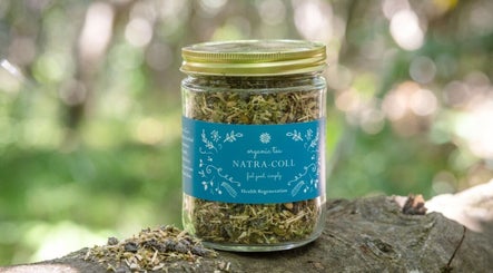Jar of organic herbal tea from NatraColl Health, Kingscliff, New South Wales, AU, showcasing natural ingredients.