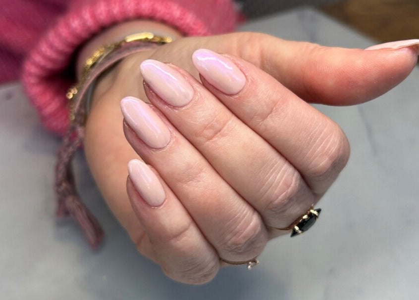 Beautiful manicured nails at Urban Beauty Studio, Godalming, England, GB showcasing soft pastel polish.