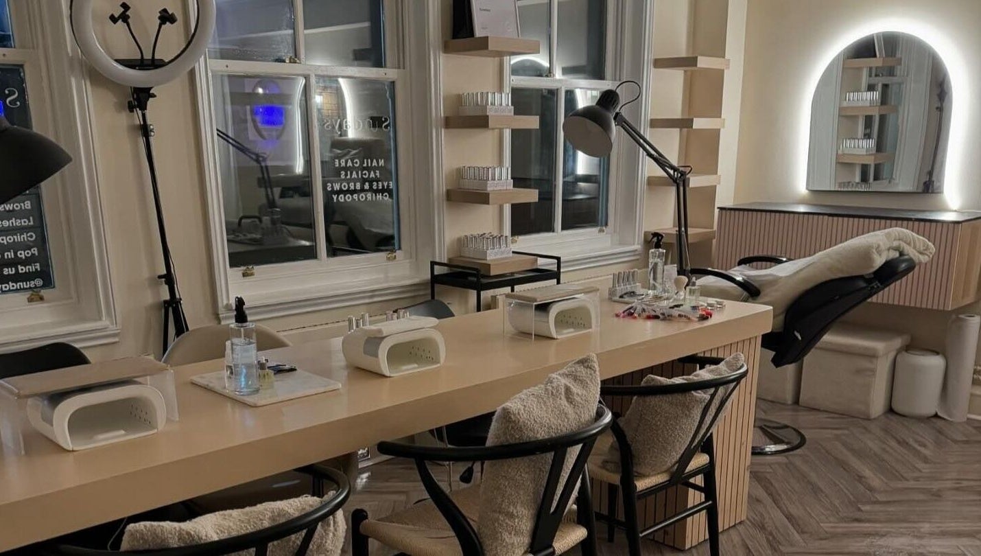 Modern nail and beauty station at Sundays, Knowle, England, GB, featuring a stylish, cozy setup.