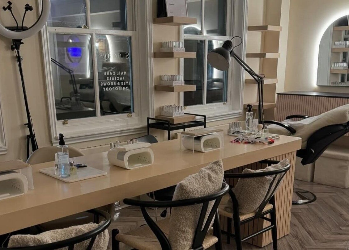 Modern nail and beauty station at Sundays, Knowle, England, GB, featuring a stylish, cozy setup.