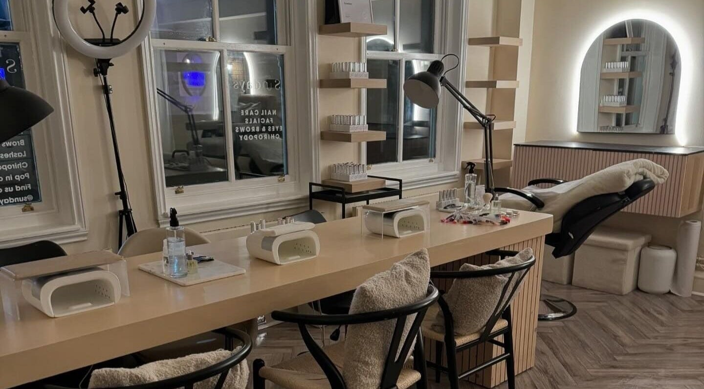 Modern nail and beauty station at Sundays, Knowle, England, GB, featuring a stylish, cozy setup.