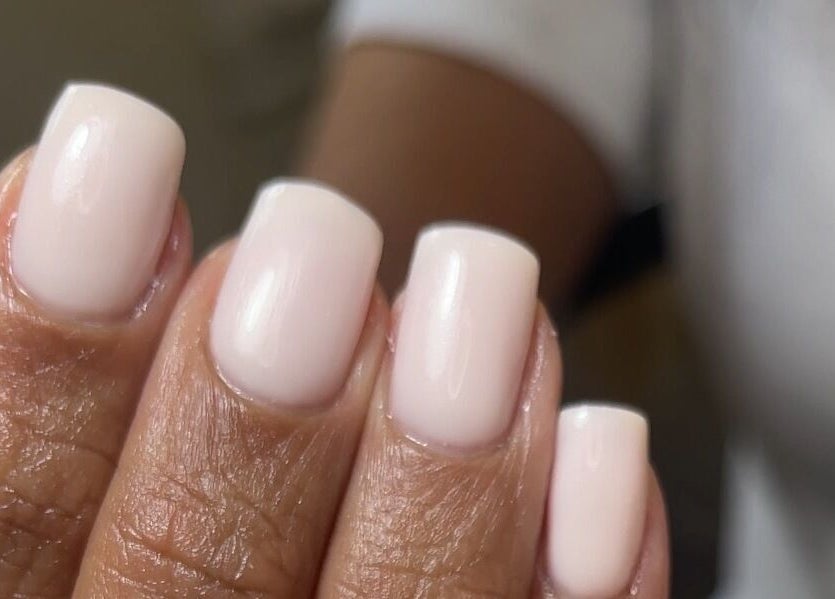 Close-up of beautifully manicured nails at Sundays, Knowle, England, GB showcasing a chic polish.