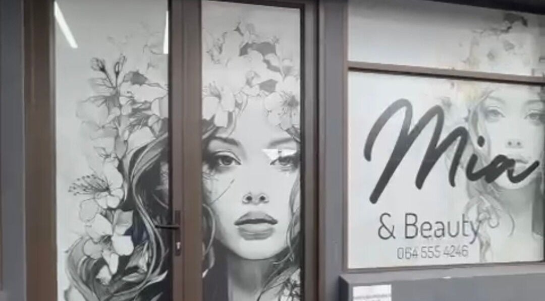 Entrance with floral mural at ChaMia Hair, Health and Beauty Centre, Parys, Free State, ZA.