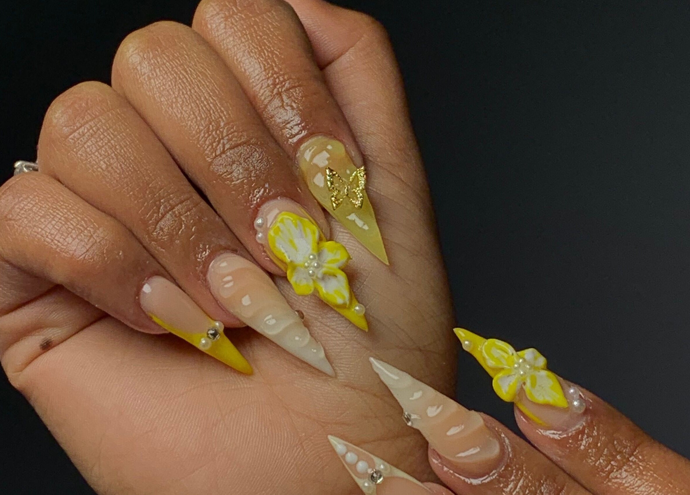 Intricate butterfly-themed nail art at CLAWZ, Cape Town, Western Cape, ZA. Perfect blend of elegance and style.