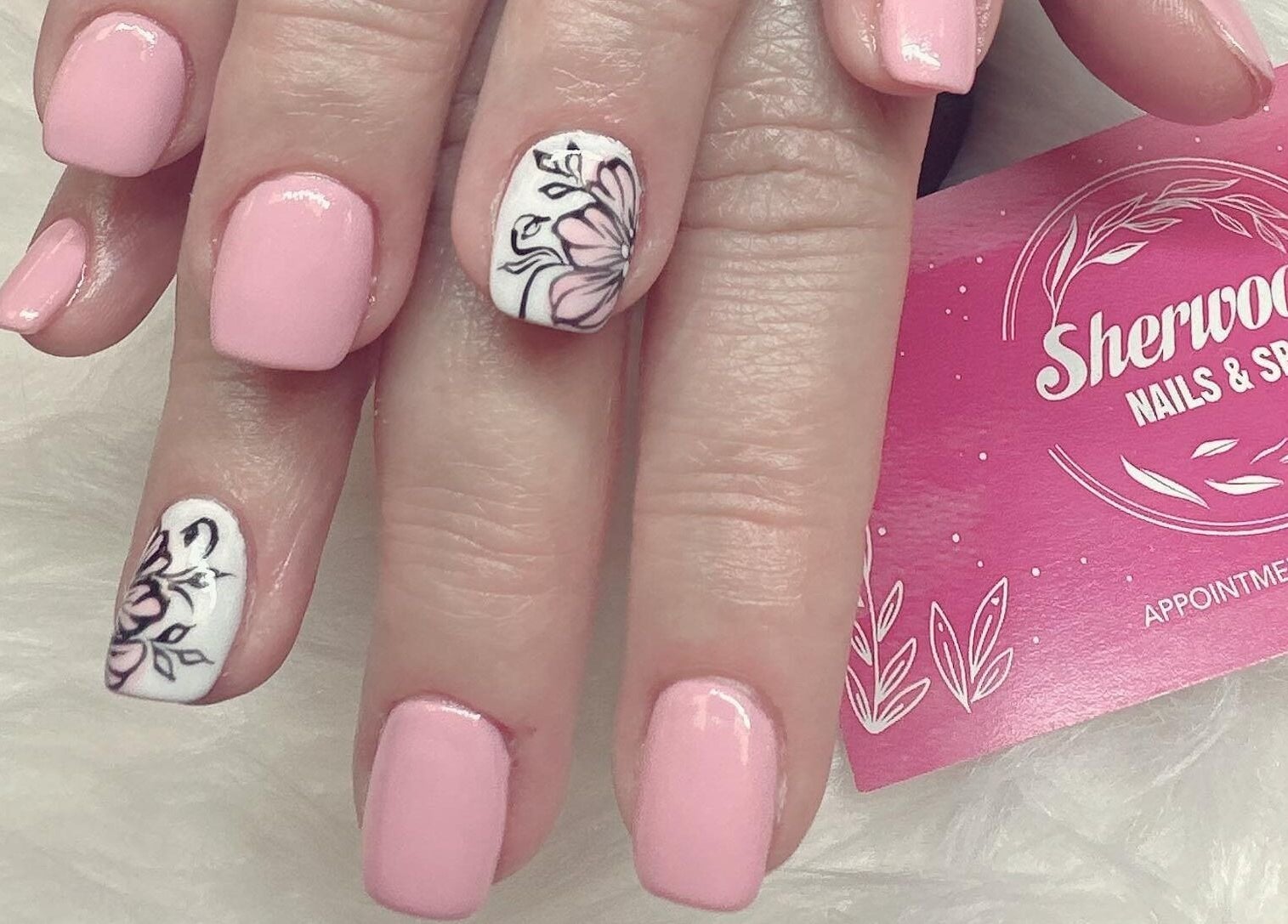 Elegant pink and floral nail art at Sherwood Nails and Spa, Sherwood Park, Alberta, CA.
