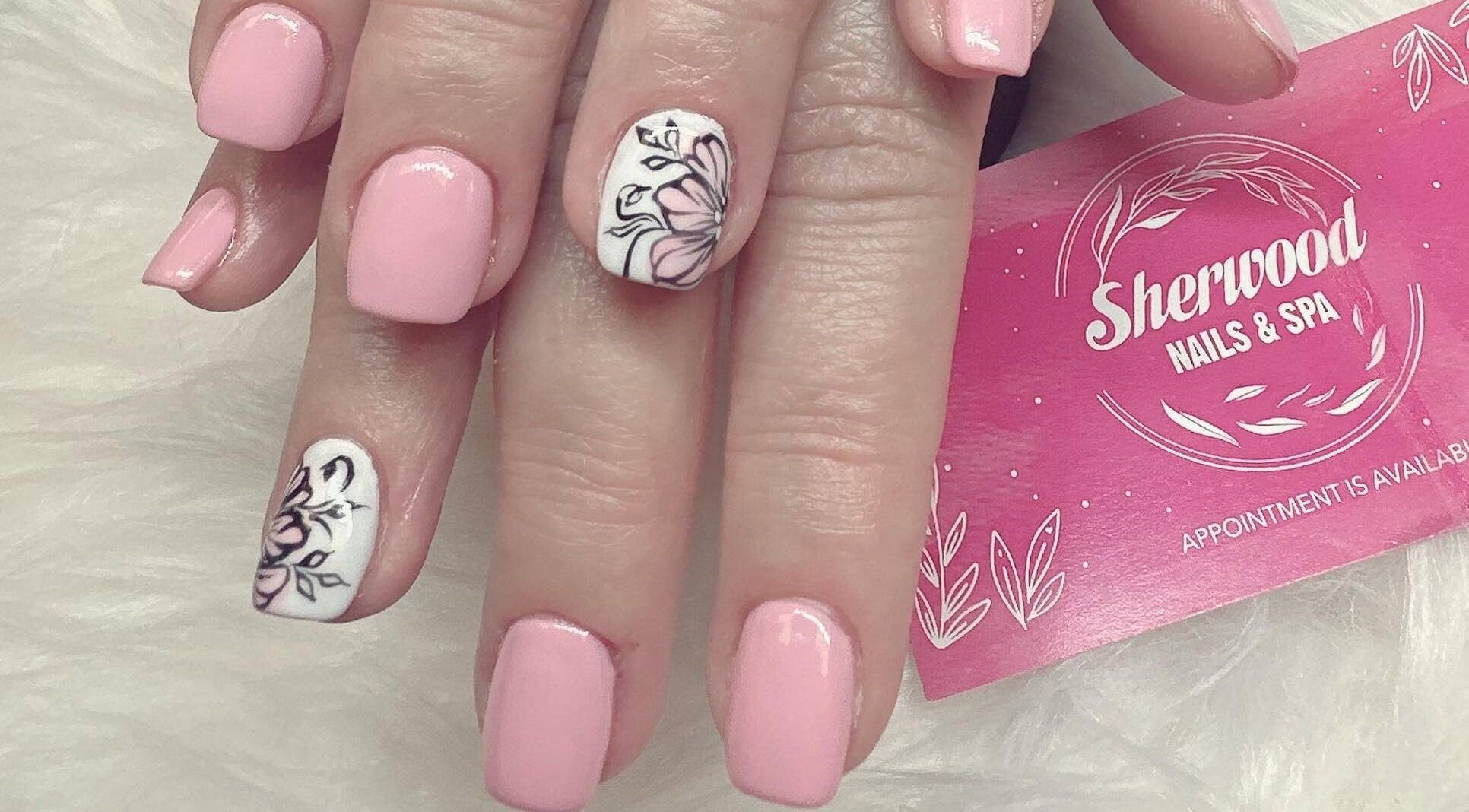 Elegant pink and floral nail art at Sherwood Nails and Spa, Sherwood Park, Alberta, CA.